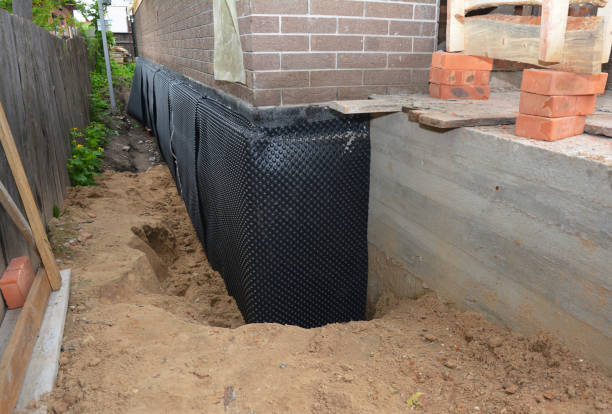 Happy homeowners after waterproofing job in Brandamore